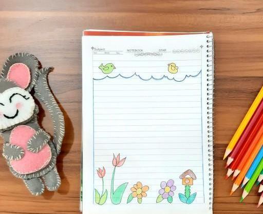 عکس نقاشی گل کنار دفتر