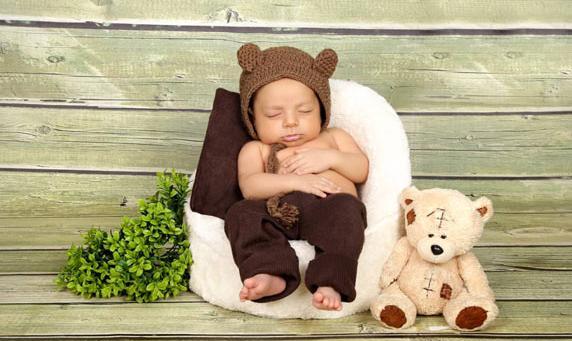 عکس نوزاد با عروسک