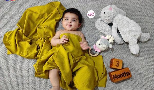 عکس نوزاد با عروسک