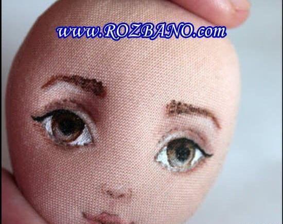 عکس نقاشی صورت عروسک روی پارچه