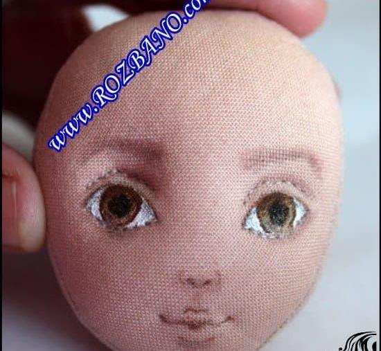 عکس نقاشی صورت عروسک روی پارچه
