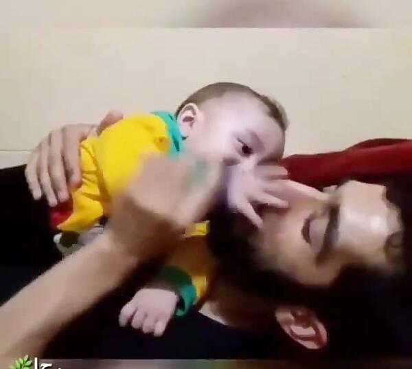 عکس محسن حججی با پسرش
