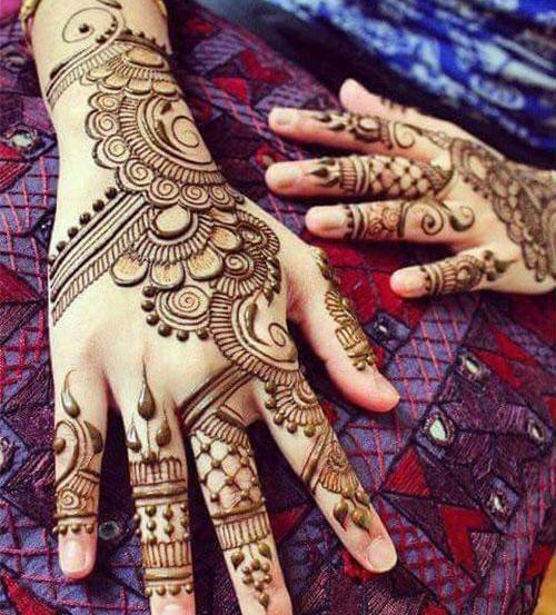 عکس حنا روی دست عروس هندی