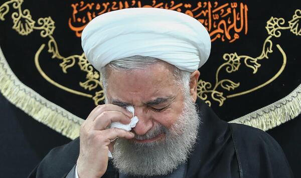 عکس گریه روحانی