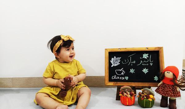 ایده عکس پاییزی کودک در منزل