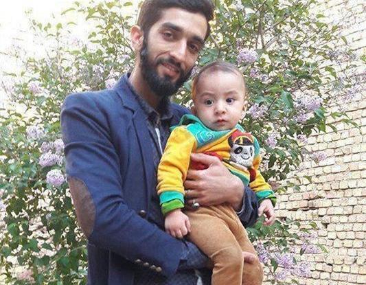 عکس شهید حججی با فرزندش