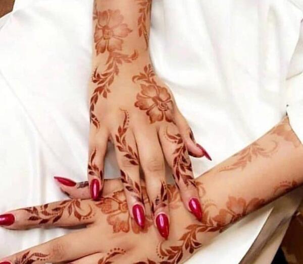 عکس نقش حنا روی دست عروس