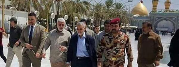 عکس حاج قاسم با لباس نظامی
