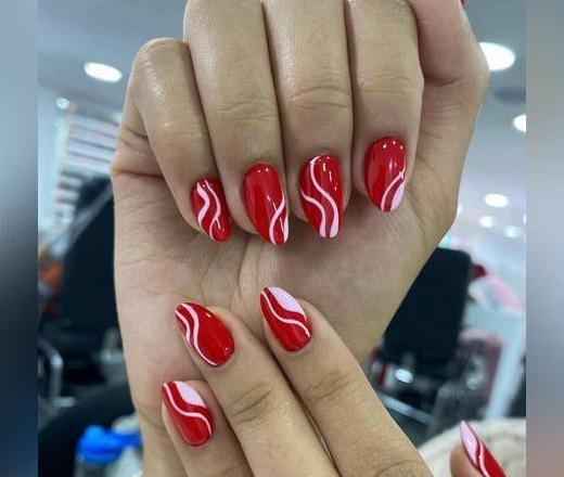 عکس مدل طراحی ناخن قرمز و مشکی