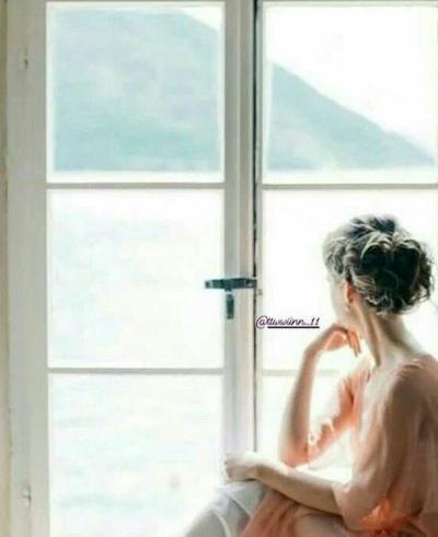 عکس دختر پشت شیشه بارانی