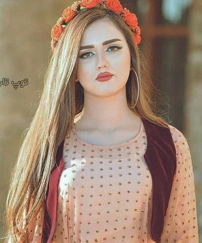 عکس دختر افغانی با لباس محلی