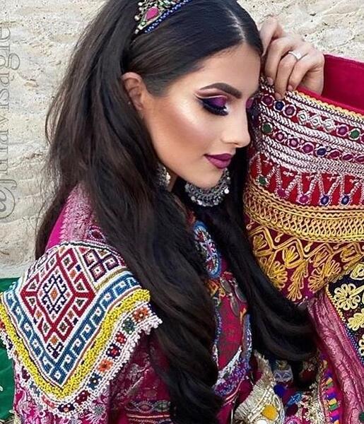عکس دختر افغانی با لباس محلی