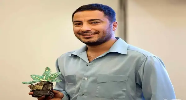 عکس احمد مهرانفر و پسرش