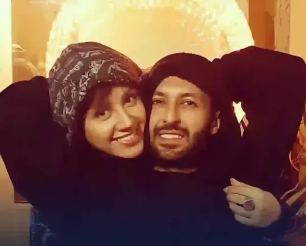عکس و بیوگرافی حسام محمودی و همسرش