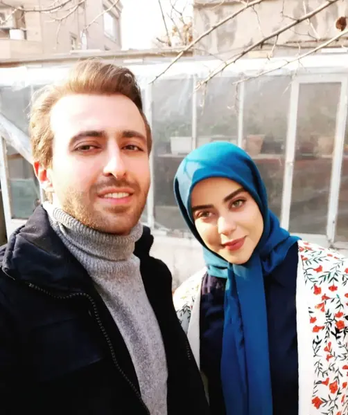 عکس و بیوگرافی حسام محمودی و همسرش