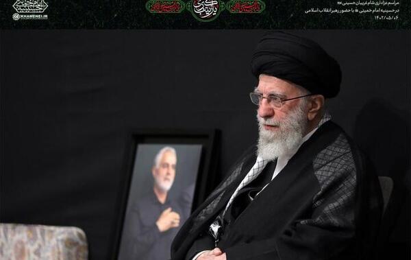 عکس آقا و شهید سلیمانی