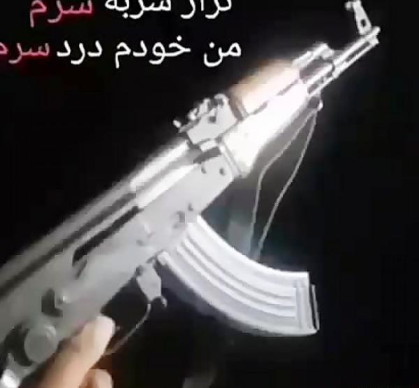 عکس حاج قاسم با تفنگ