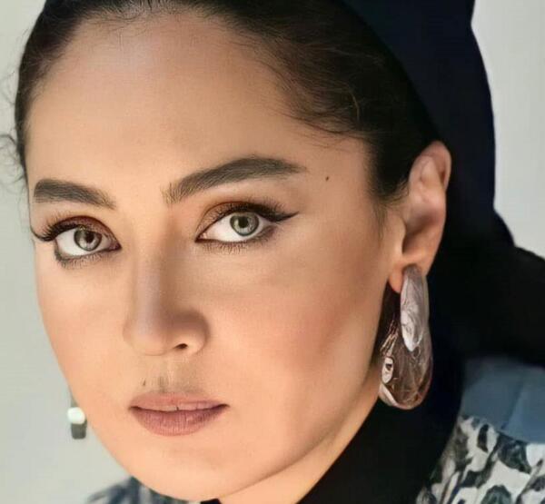 عکس همسر نیکی کریمی و فرزندش