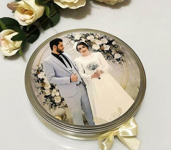 عکس عروس داماد روی کیک