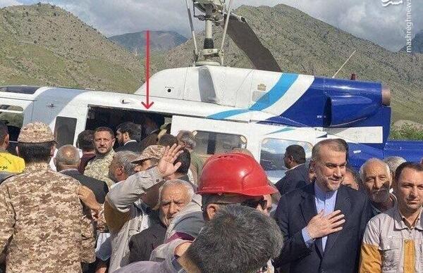 عکس بادیگارد رئیسی که داخل هلیکوپتر بود
