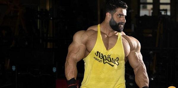 عکس هادی چوپان کنار ارنولد