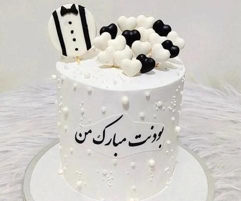 عکس کیک تولد دخترانه تم سفید مشکی