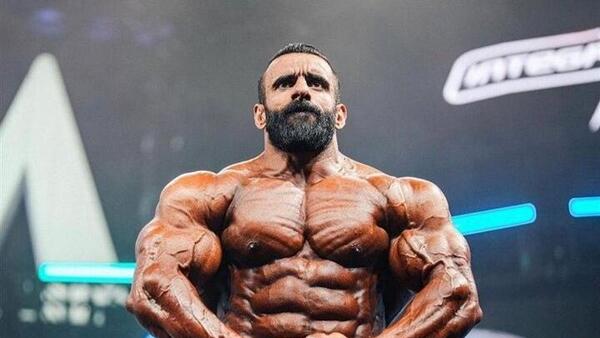 عکس هادی چوپان با آرنولد