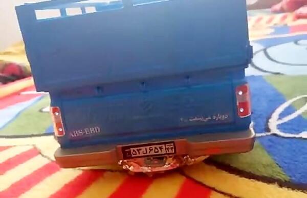 عکس نیسان آبی اسباب بازی اسپرت
