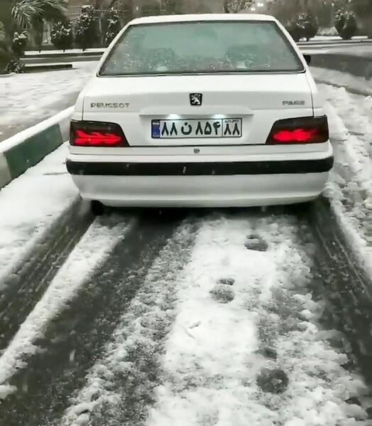عکس پژو پارس در برف
