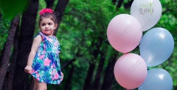 ژست عکس تولد در طبیعت بچه گانه