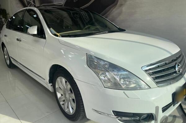 عکس ماشین نیسان تی ینا (مونتاژ) xl