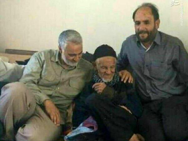 عکس شهید سلیمانی با پدر و مادرش