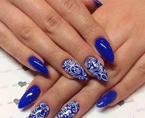 عکس مدل طراحی ناخن سفید و آبی