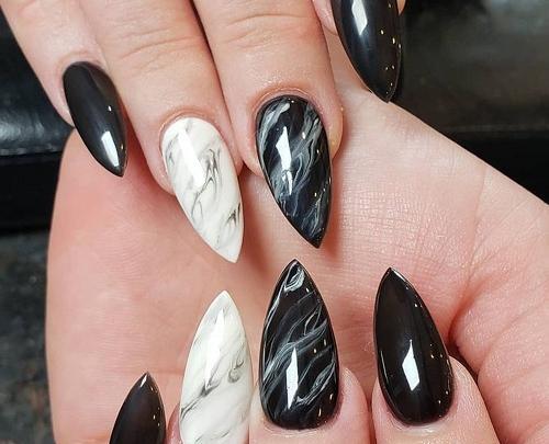 عکس طرح ناخن نارنجی مشکی