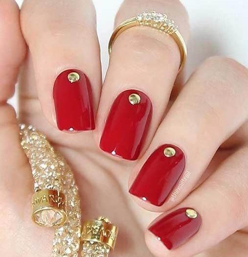 عکس مدل ناخن قرمز و طلایی