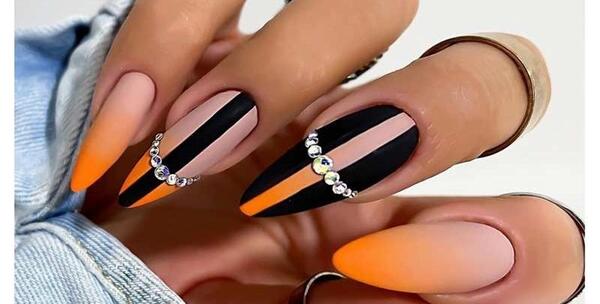 عکس طرح ناخن نارنجی سفید