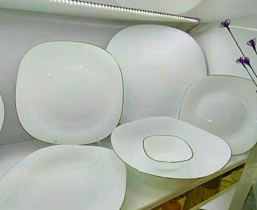 عکس ظرف سفید دور طلایی