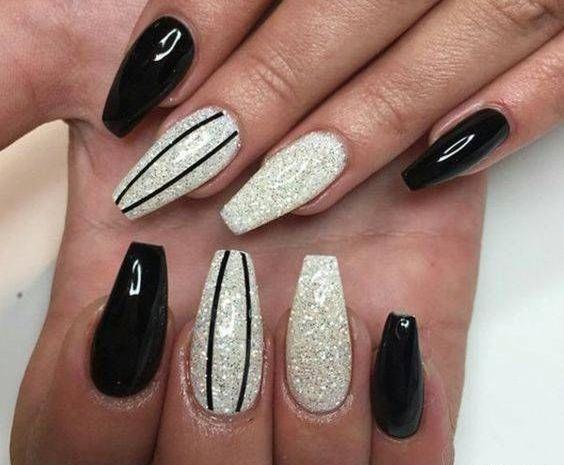 عکس طرح ناخن نقره ای مشکی