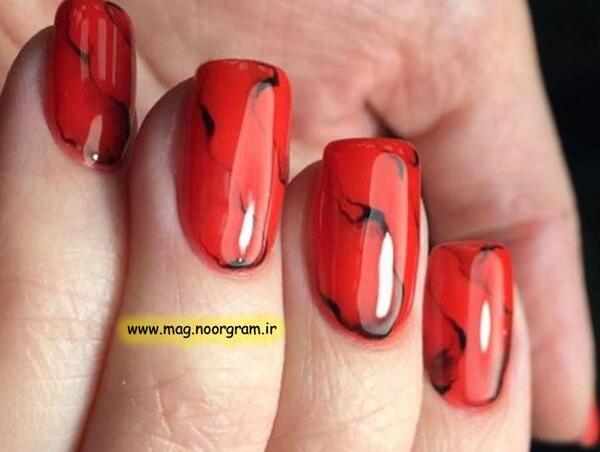عکس مدل لاک ناخن قرمز مشکی