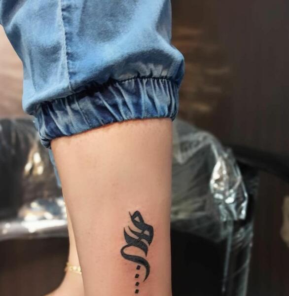 عکس تاتو روی دست هیچ