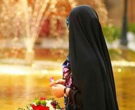 عکس دختر چادری با گل آفتابگردان