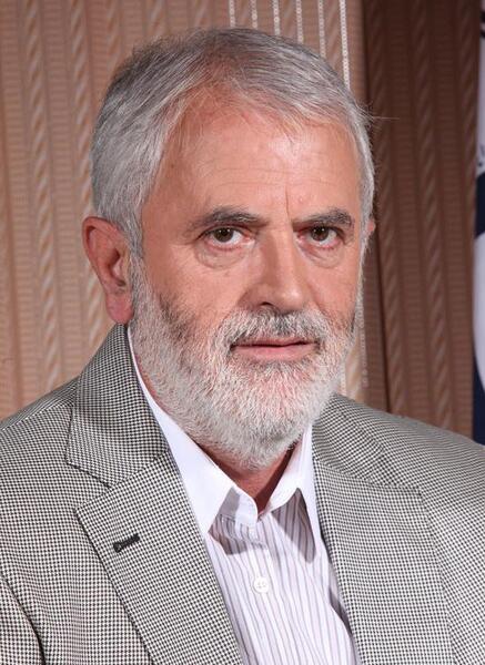 عکس کلاه پشمی دکتر روازاده