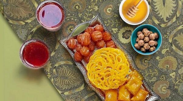 عکس پخت زولبیا و بامیه