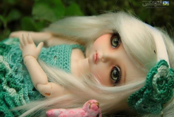 عکس عروسک چشم آبی