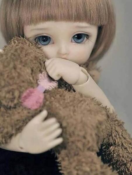 عکس عروسک چشم آبی