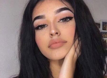 عکس دختر چشم آبی با موهای مشکی
