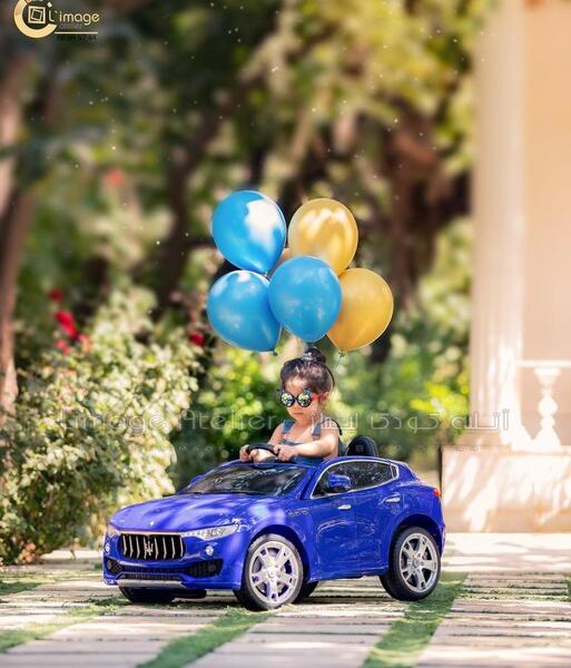ژست عکس کودک با ماشین