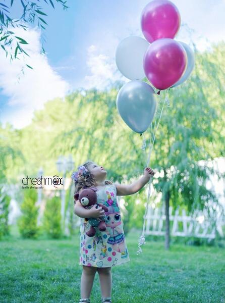عکس آتلیه کودک در باغ