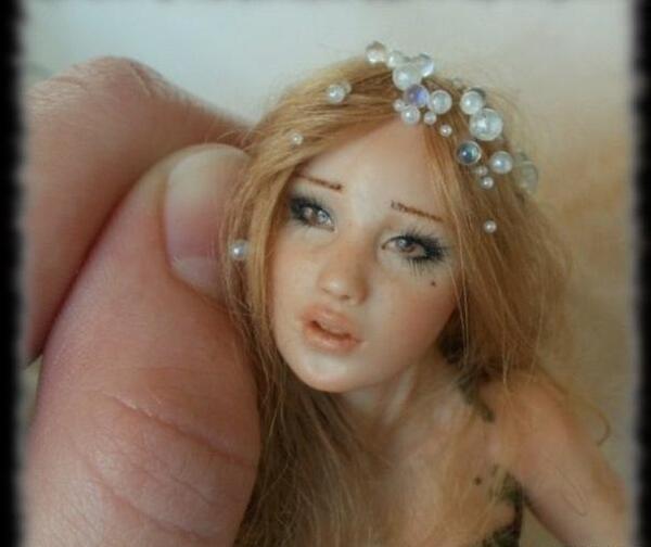 عکس نقاشی صورت عروسک با رنگ اکریلیک