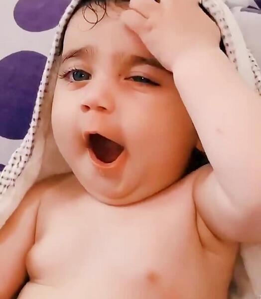 عکس نی نی پسر چشم مشکی